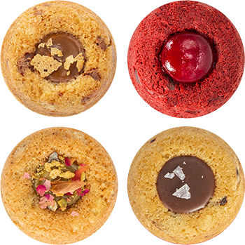 Assorted gourmet filled cookies viewed from above on Homepage 001.